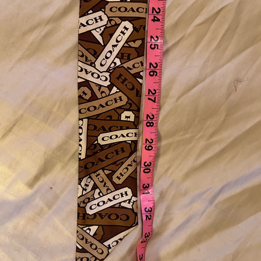 NWOT Vintage Coach thin & long Brown Scarf w variety of Coach insignia